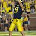 Michigan wide receiver Drew Dileo signals to the crowd as he celebrates scoring a touchdown during the fourth quarter against Notre Dame at Michigan Stadium on Saturday, September 7, 2013. Michigan beat Notre Dame 41 - 30. Melanie Maxwell | AnnArbor.com